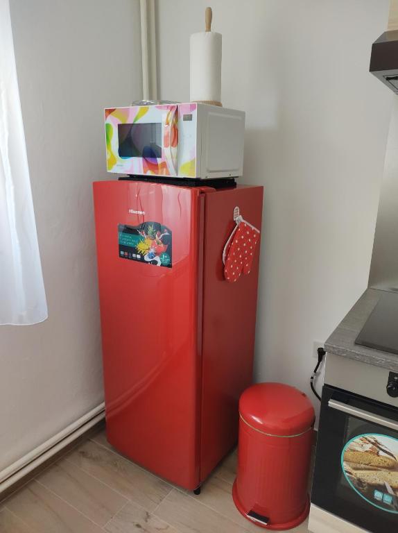 Kuchyň nebo kuchyňský kout v ubytování Happy Apartment