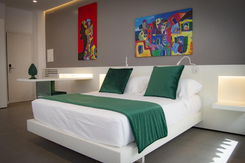 Postel nebo postele na pokoji v ubytování FuoriSquadra B&B