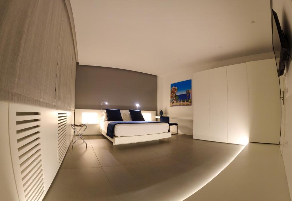TV a/nebo společenská místnost v ubytování FuoriSquadra B&B