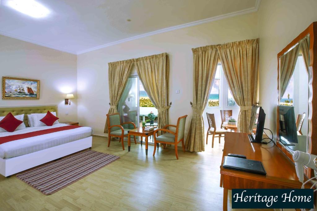 Postel nebo postele na pokoji v ubytování Al Seef Hotel
