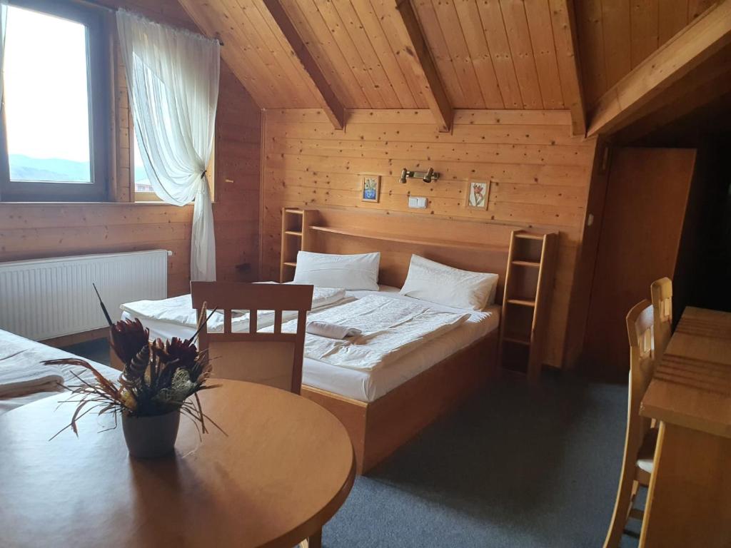 Postel nebo postele na pokoji v ubytování Hotel PAM
