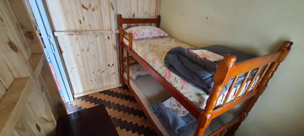 Postel nebo postele na pokoji v ubytování Hostel Caxias do Sul