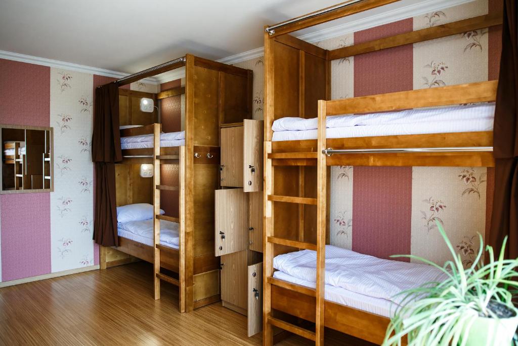 Postel nebo postele na pokoji v ubytování Sweet Home Hostel