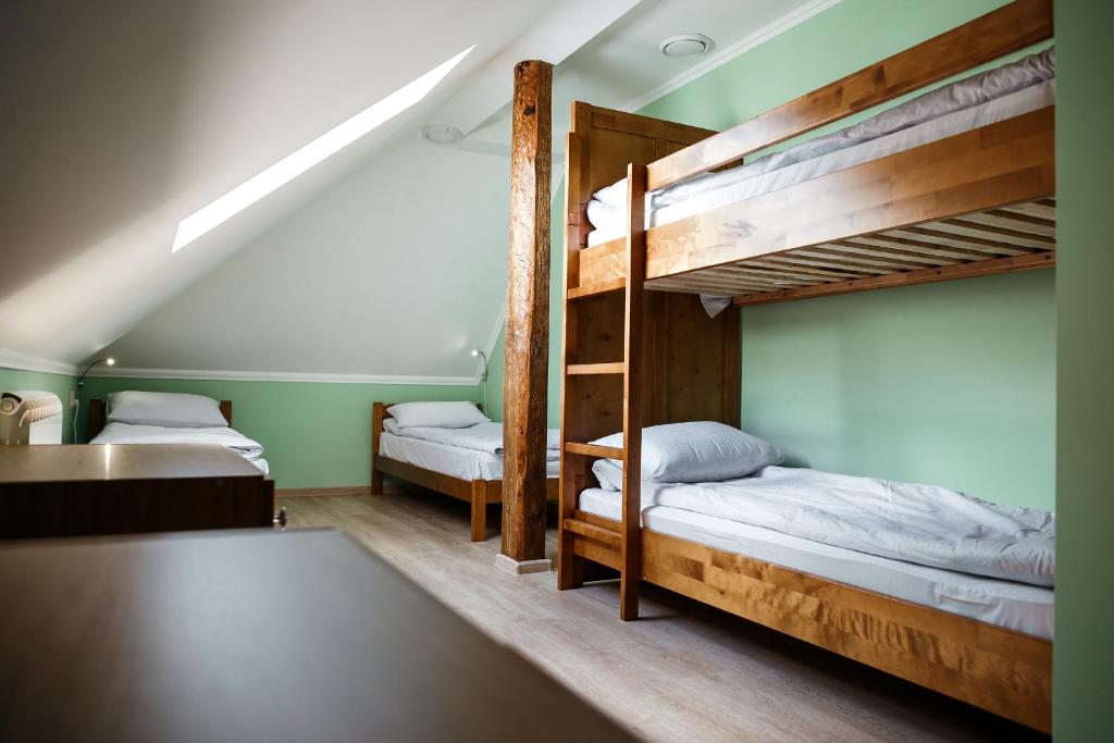 Postel nebo postele na pokoji v ubytování Sweet Home Hostel