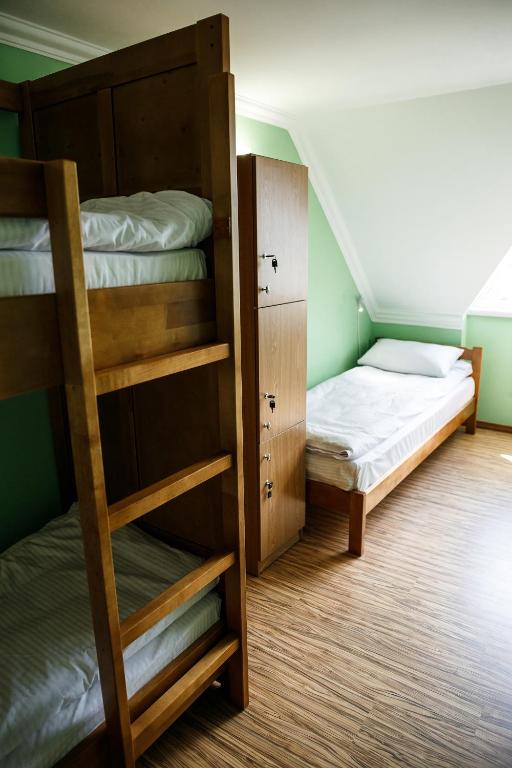 Postel nebo postele na pokoji v ubytování Sweet Home Hostel