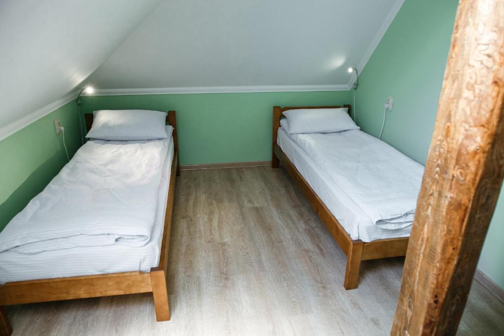 Postel nebo postele na pokoji v ubytování Sweet Home Hostel