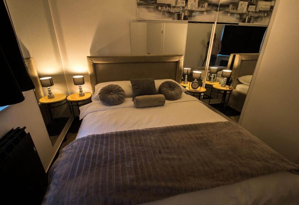 Posteľ alebo postele v izbe v ubytovaní Apartman Slay
