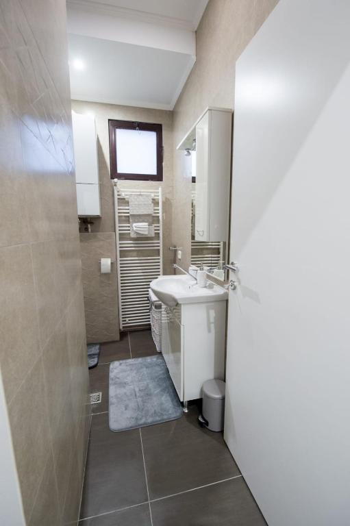 Kúpeľňa v ubytovaní Apartman Slay