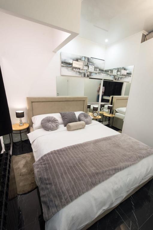 Posteľ alebo postele v izbe v ubytovaní Apartman Slay