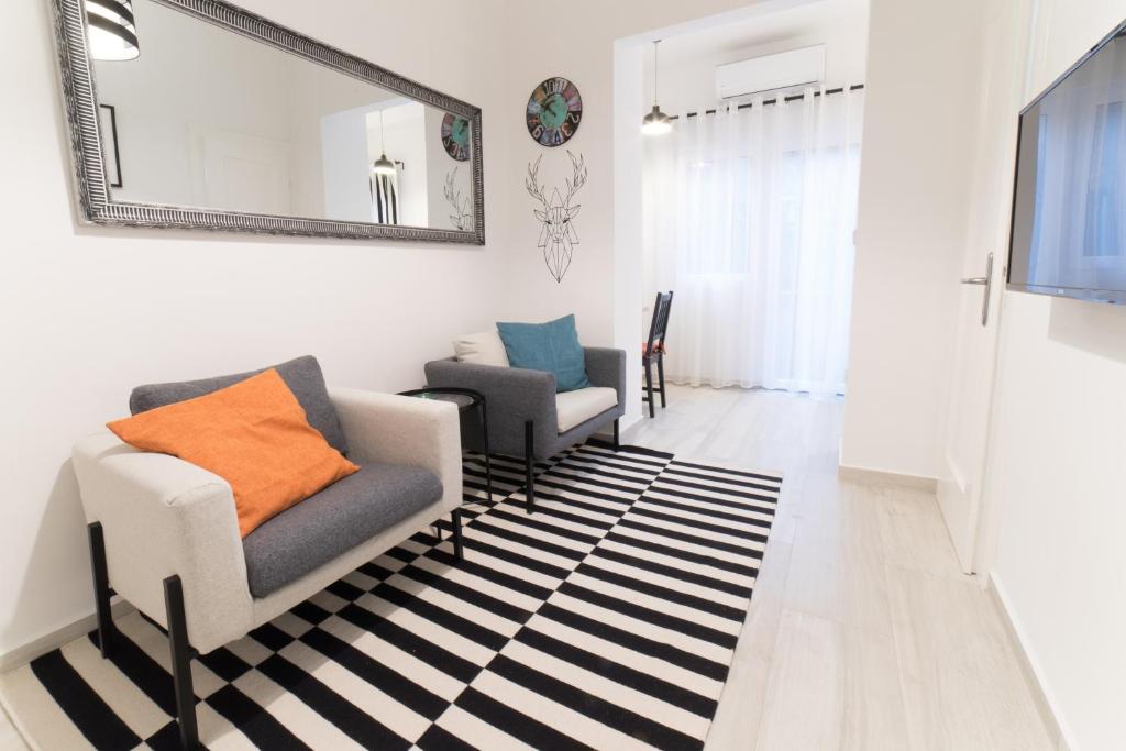 Posedenie v ubytovaní Angela Luxury Studio Apartment