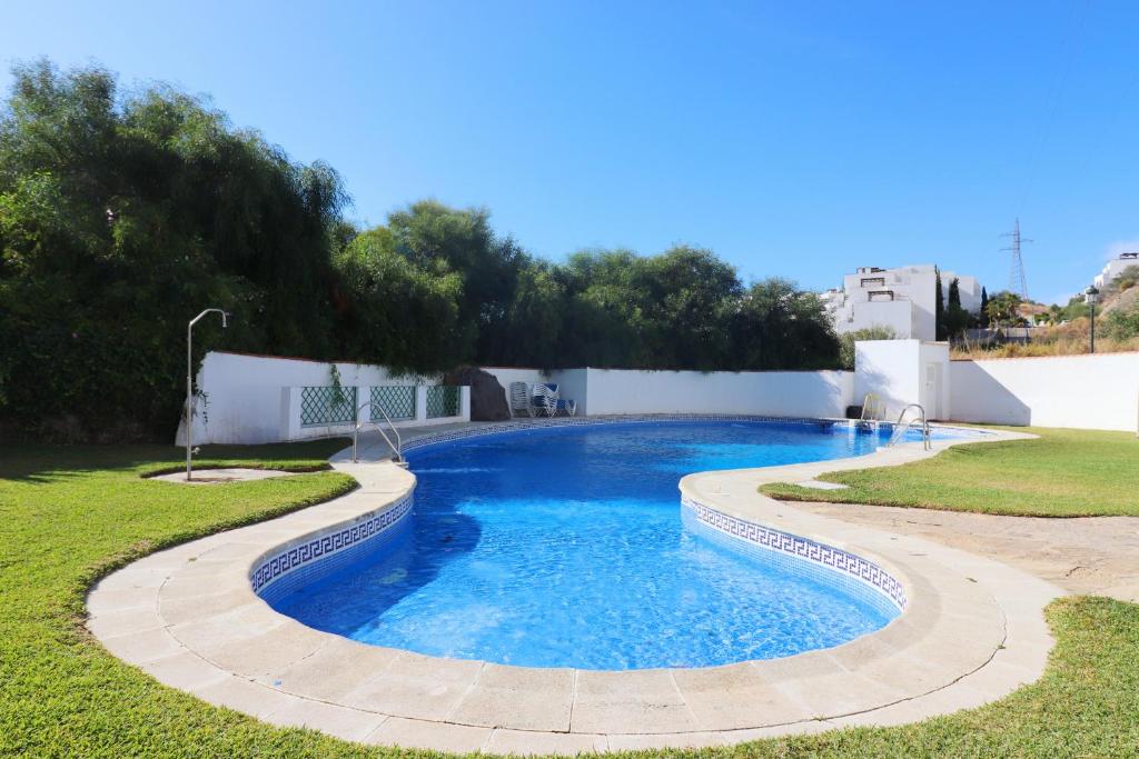 Bazén v ubytovaní Casa Neptuno Spainsunrentals 1205 alebo v jeho blízkosti