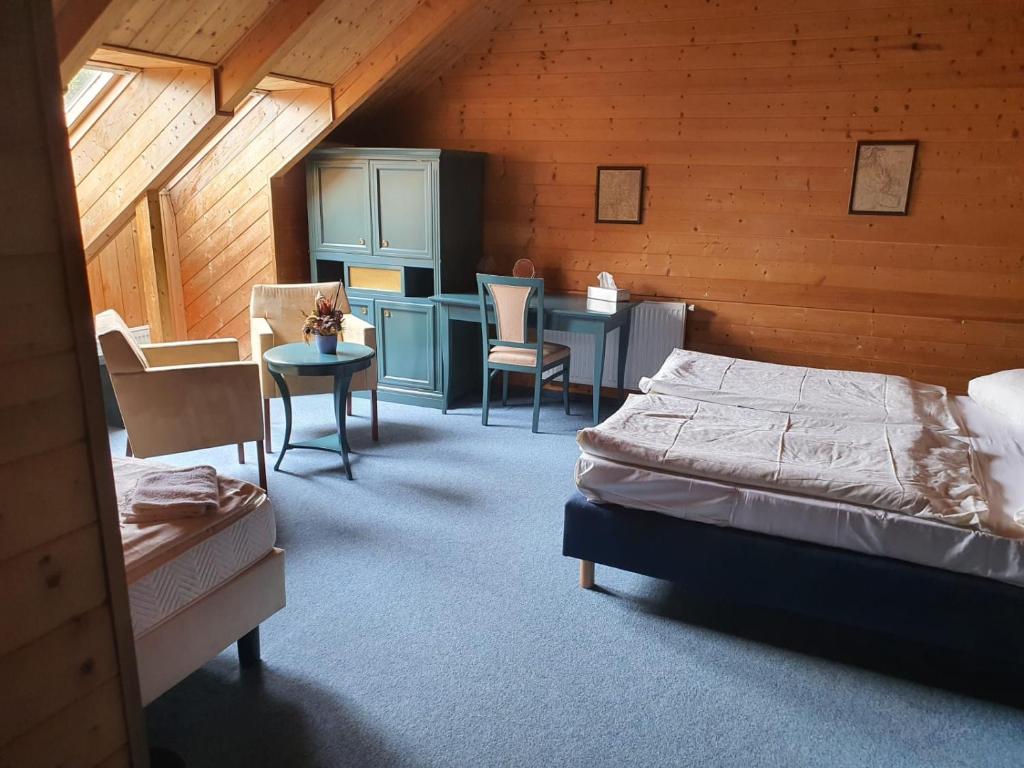 Postel nebo postele na pokoji v ubytování Hotel PAM