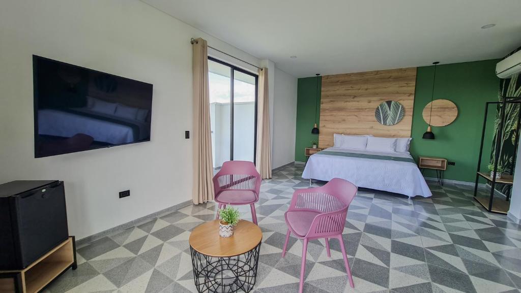 TV a/nebo společenská místnost v ubytování Hotel Arbóreo Doradal