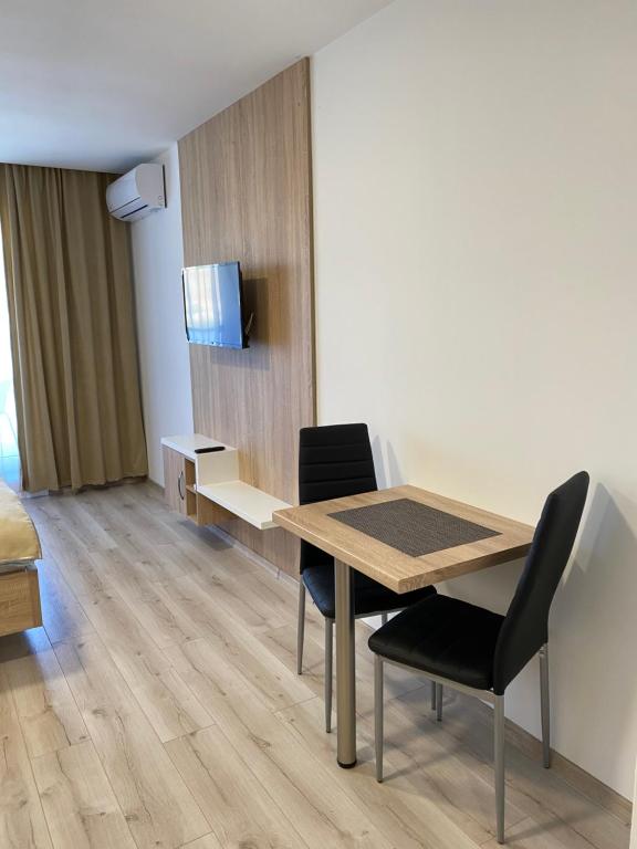 TV a/nebo společenská místnost v ubytování Apartmán Flower