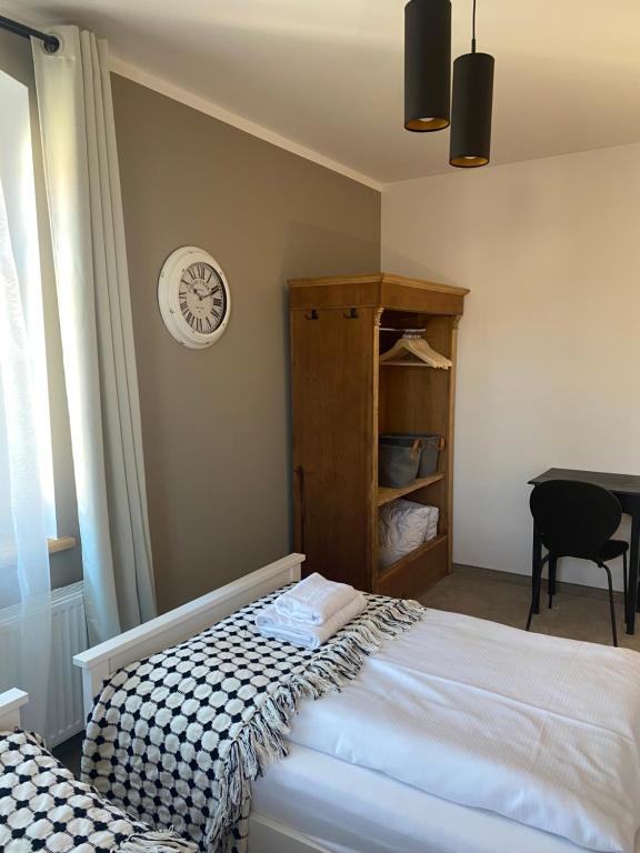 Posteľ alebo postele v izbe v ubytovaní Apartamenty sudeckie nad zalewem III