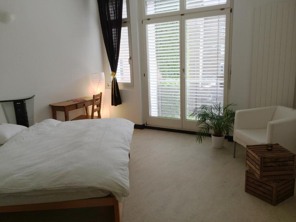 Postel nebo postele na pokoji v ubytování B&B im Herzen von Biel