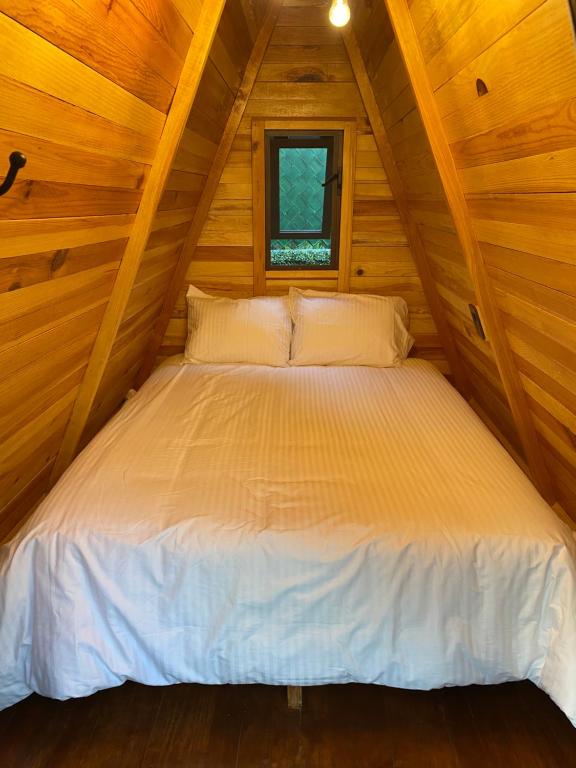 Postel nebo postele na pokoji v ubytování Villa Chica