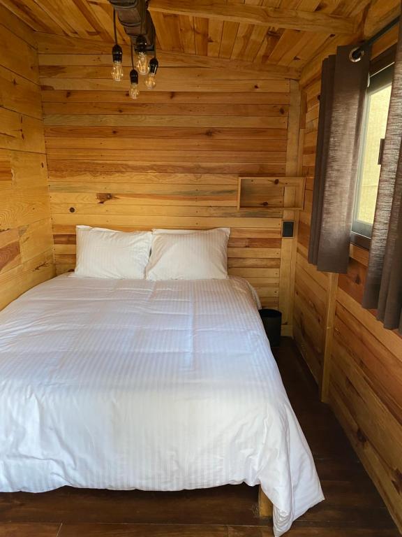 Postel nebo postele na pokoji v ubytování Villa Chica