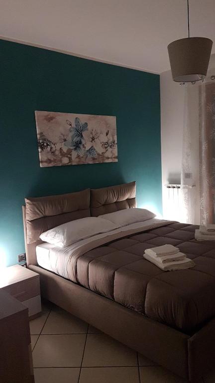 Łóżko lub łóżka w pokoju w obiekcie NickyHouse Holiday Home