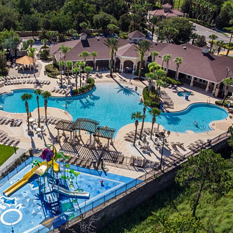 an overhead view of a pool at a resort at Condominium Apartment Close to Disney in Orlando Florida in Orlando
