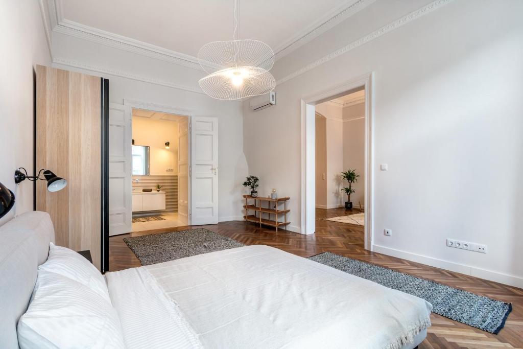 Posteľ alebo postele v izbe v ubytovaní Central Basilica Apartman