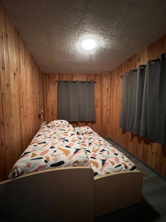 Postel nebo postele na pokoji v ubytování Le cocon des Nestes