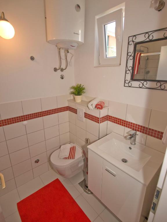 Koupelna v ubytování Apartments Barka