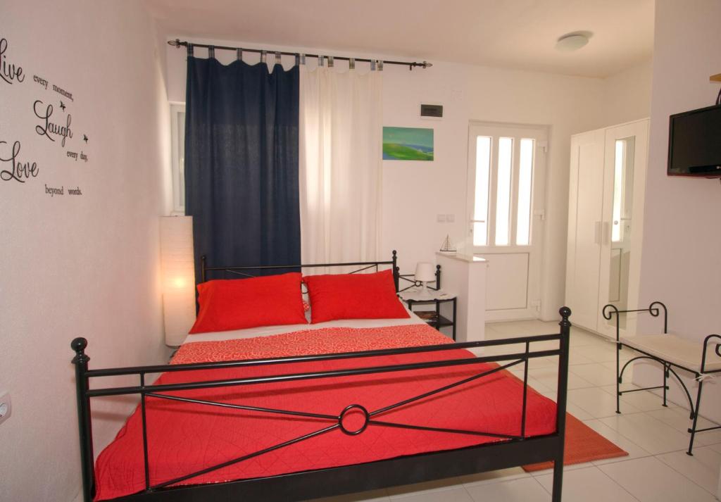 Postel nebo postele na pokoji v ubytování Apartments Barka
