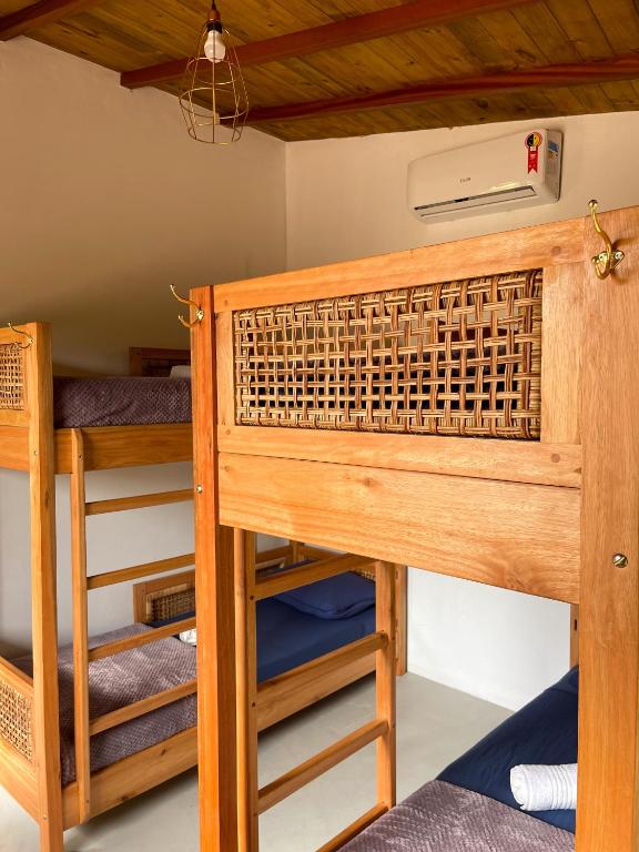 Postel nebo postele na pokoji v ubytování Vulva Caraíva Hostel e Pousada para Mulheres