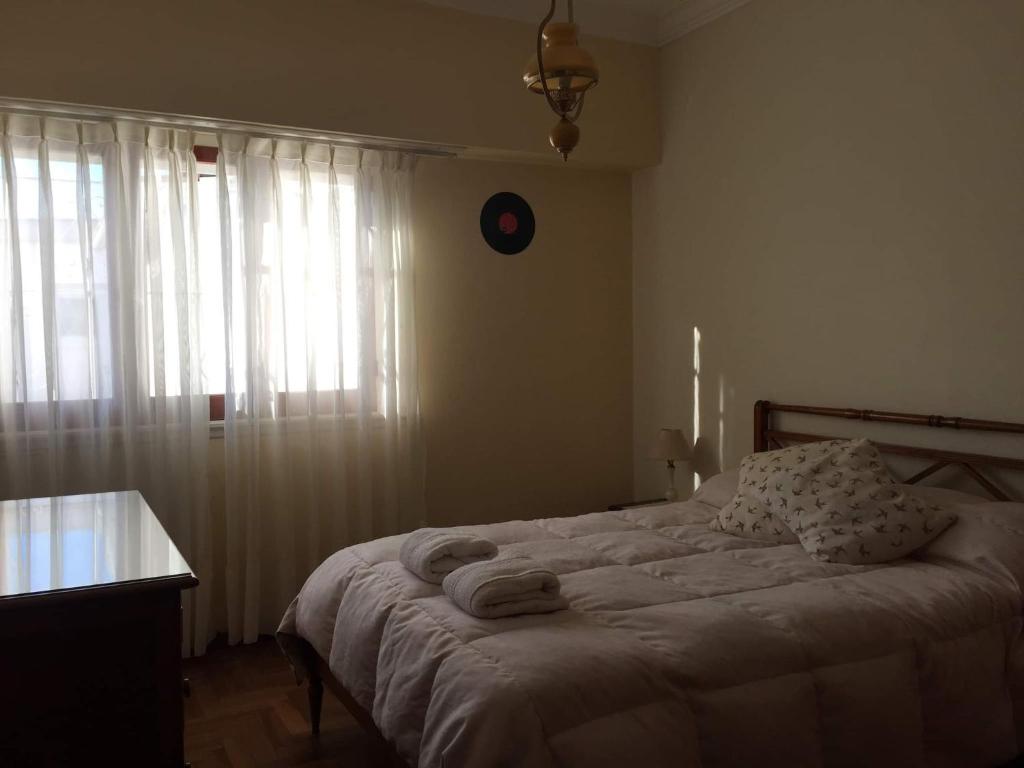 Cama o camas de una habitación en Casa barrio residencial