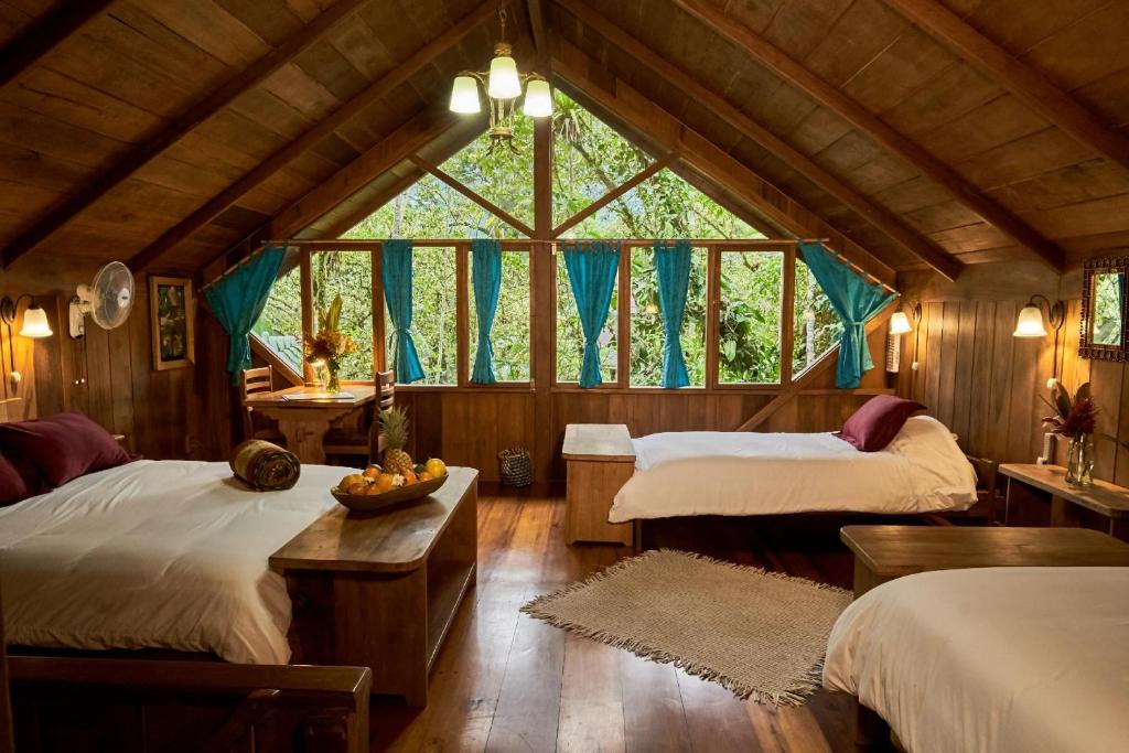 Postel nebo postele na pokoji v ubytování Casa Divina Eco Lodge