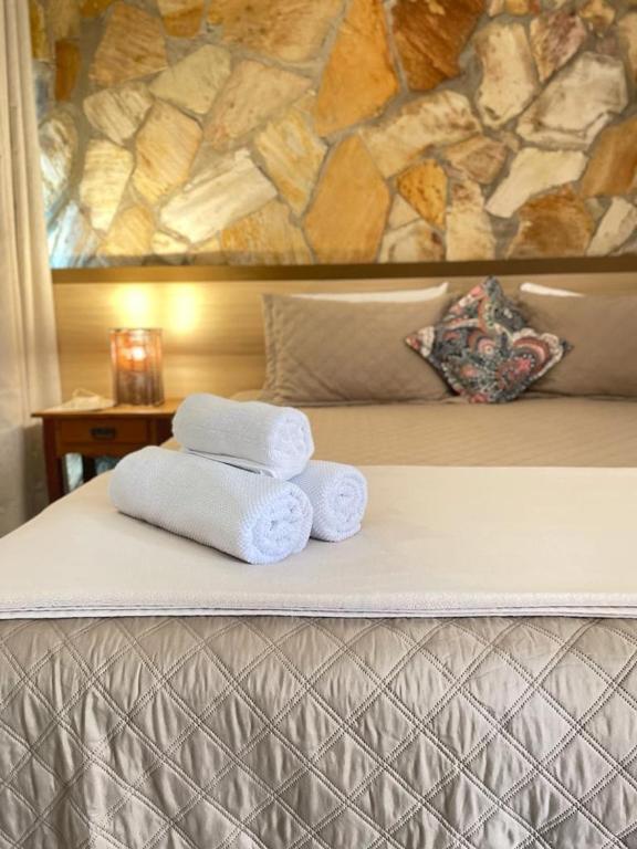 Postel nebo postele na pokoji v ubytování Villa Triacca Hotel Vinícola & Spa