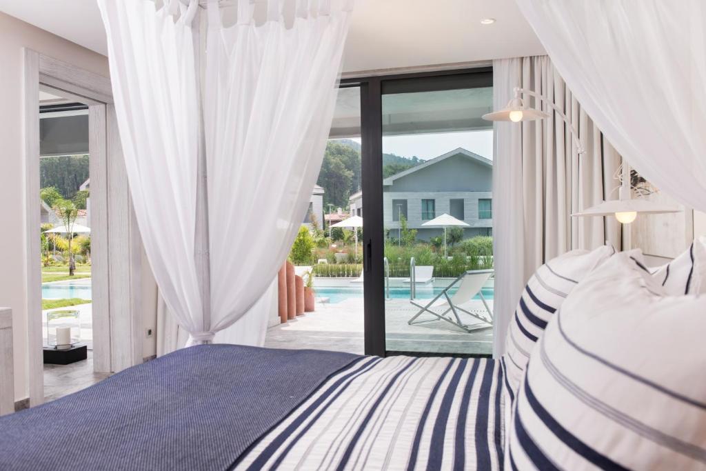 Postel nebo postele na pokoji v ubytování D-Resort Gocek