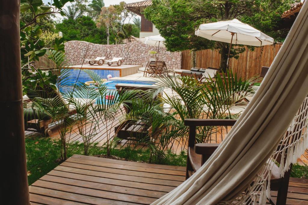 A piscina localizada em Pousada Villa Bella ou nos arredores