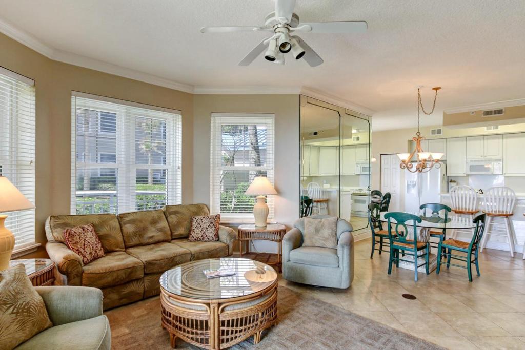 a living room with a couch and a table at Ocean Place II in Fernandina Beach