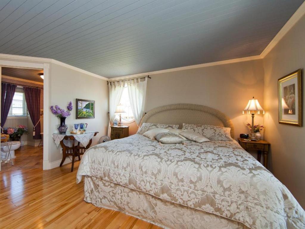 Postel nebo postele na pokoji v ubytování Maison Victoria