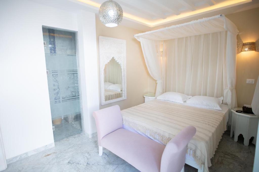 Postel nebo postele na pokoji v ubytování Dar Hammamet Guest House & Hammam