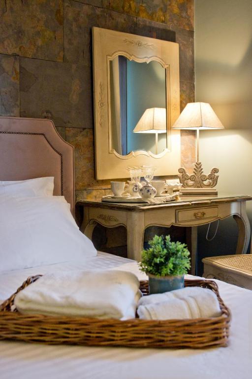 Postel nebo postele na pokoji v ubytování Hotel Galini