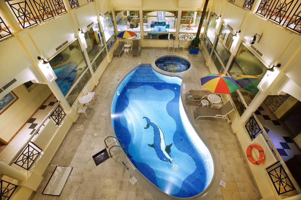 Bazén v ubytování Al Seef Hotel nebo v jeho okolí