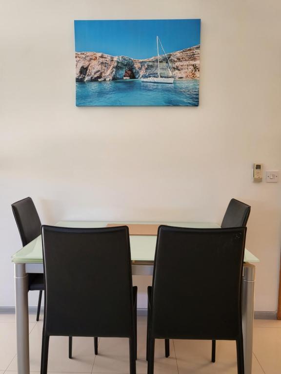Posezení v ubytování Ir-Rixa Holiday Penthouse