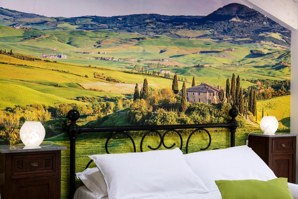 Postel nebo postele na pokoji v ubytování Acquamarina b&b