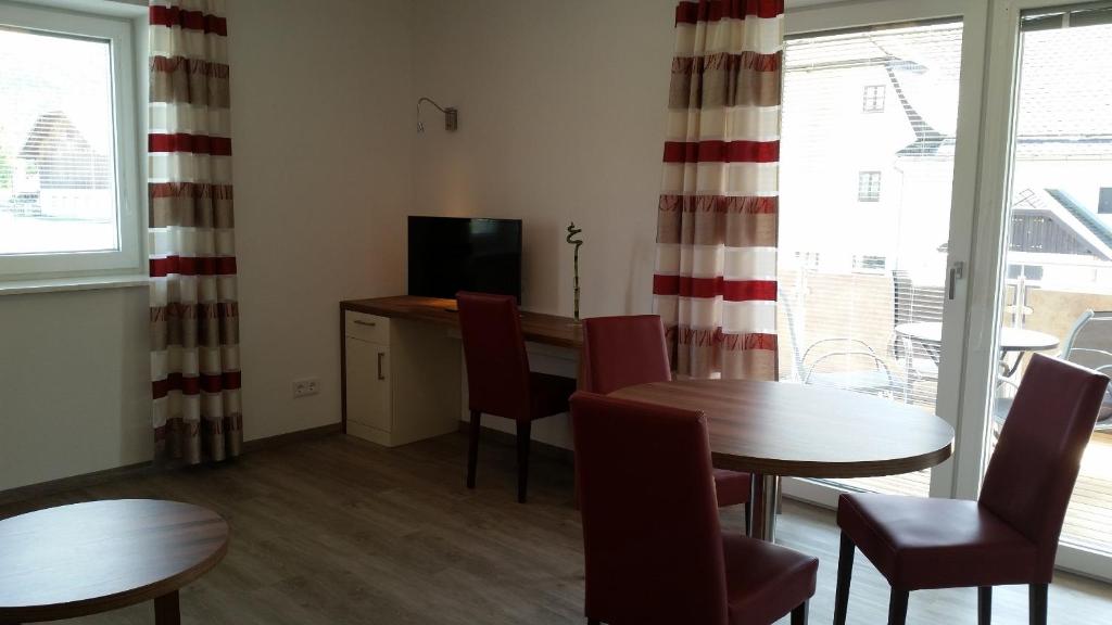 Televízia a/alebo spoločenská miestnosť v ubytovaní K3 - Appartements