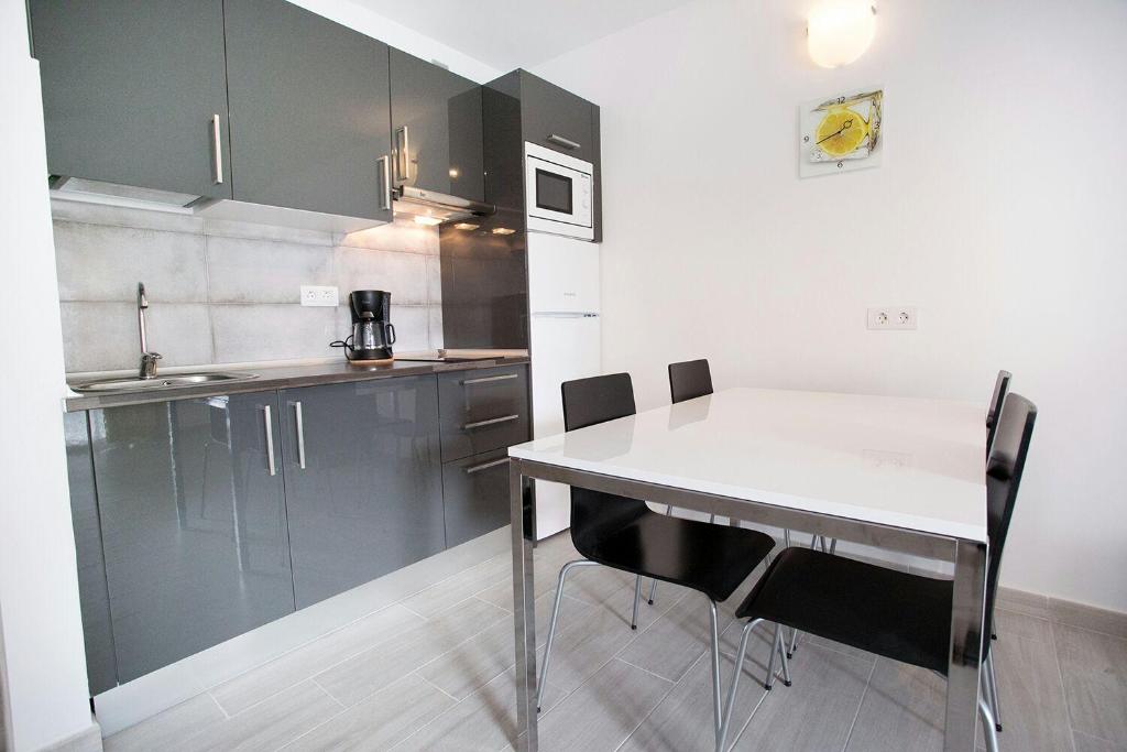 Kuchyň nebo kuchyňský kout v ubytování Vivienda Vacacional Erido