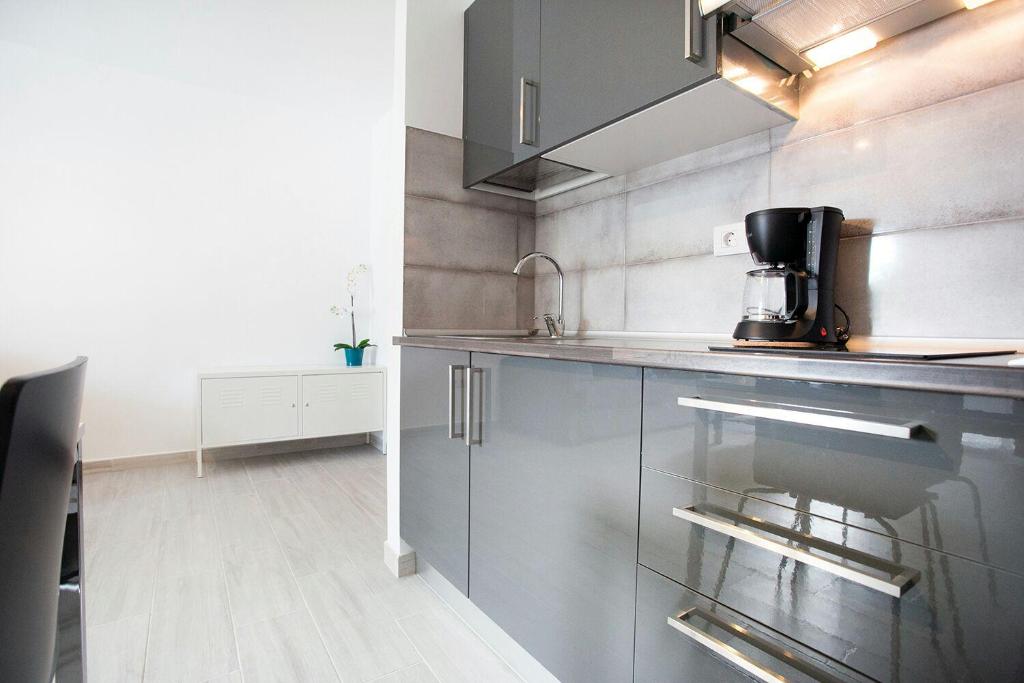 Kuchyň nebo kuchyňský kout v ubytování Vivienda Vacacional Erido