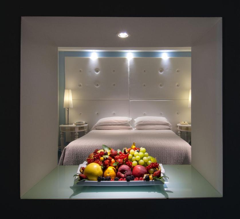Posteľ alebo postele v izbe v ubytovaní Hotel Mediterraneo