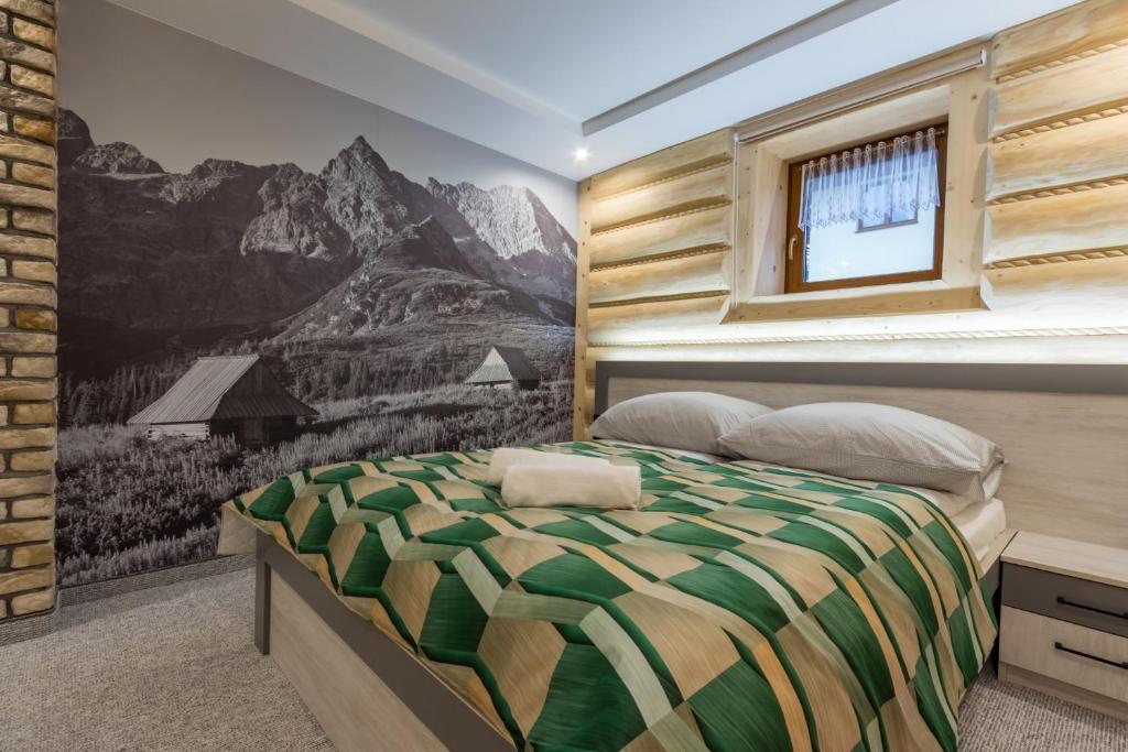 Posteľ alebo postele v izbe v ubytovaní Apartamenty Chłabówka