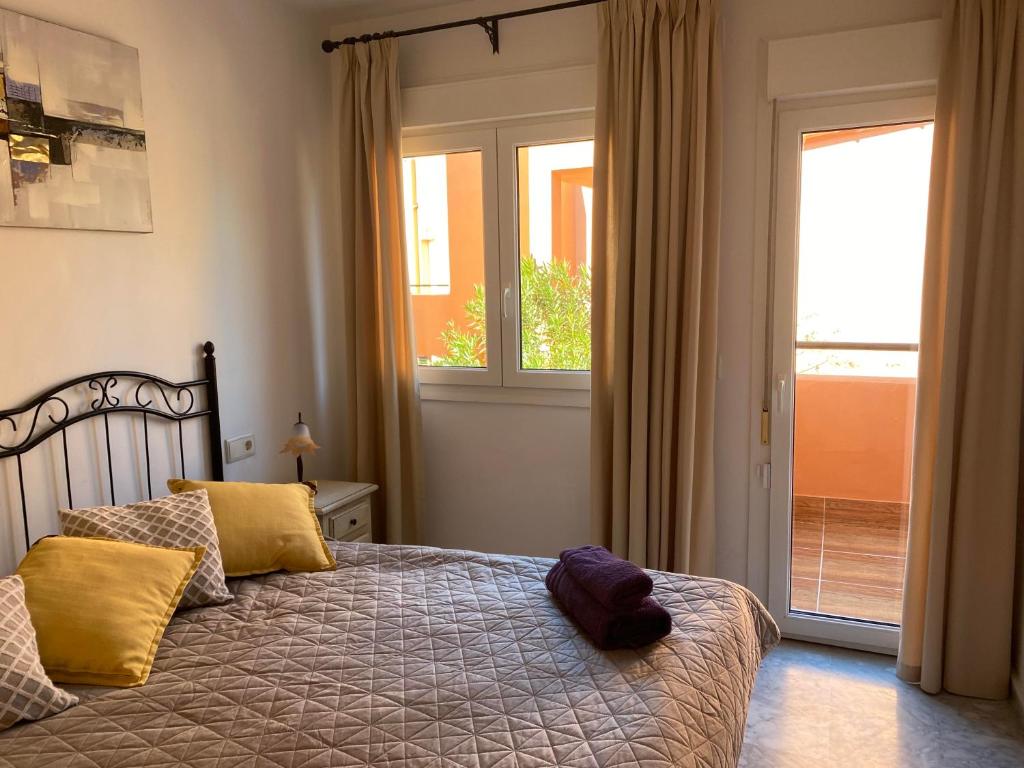 Posteľ alebo postele v izbe v ubytovaní Manilva Beach Casa de Pedro
