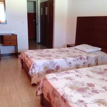 Postel nebo postele na pokoji v ubytování Residencial Laginha