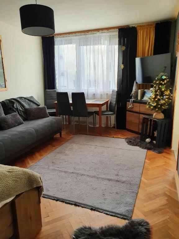 Posedenie v ubytovaní Apartament IZBA W CENTRUM