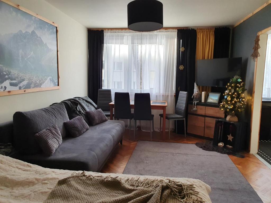 Posedenie v ubytovaní Apartament IZBA W CENTRUM